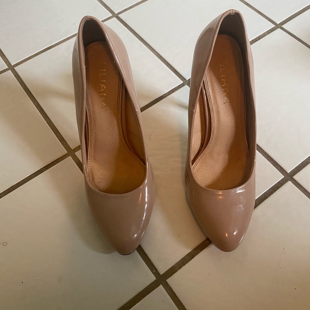 These are nude heels. Perfect to compliment almost any outfit.